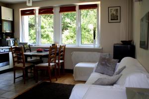 Posteľ alebo postele v izbe v ubytovaní Apartament Kolberga w Sopocie