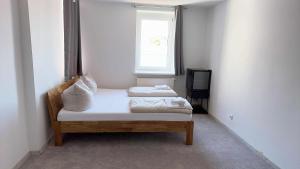 Ένα ή περισσότερα κρεβάτια σε δωμάτιο στο Hoa Xuan Pension