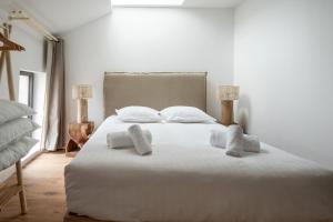 Postel nebo postele na pokoji v ubytování Villa Ninon Disneyland