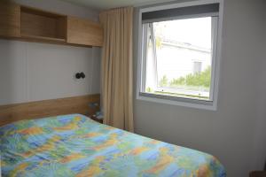 Ένα ή περισσότερα κρεβάτια σε δωμάτιο στο Chez lolo 7 à 8 personnes