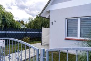 Balkón nebo terasa v ubytování Kajütenhus Komfort-Ferienwohnungen