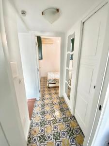 Postel nebo postele na pokoji v ubytování La Perla del Porto di Maratea House