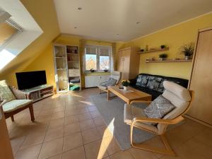 Televiisor ja/või meelelahutuskeskus majutusasutuses Haus Njord