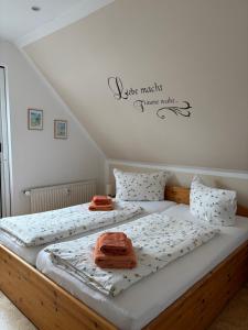 Voodi või voodid majutusasutuse Haus Njord toas