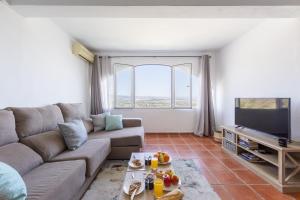 Μια τηλεόραση ή/και κέντρο ψυχαγωγίας στο AlmeriaSuite Casa de Luz