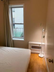 Postel nebo postele na pokoji v ubytování Ocean Side Apartment Beach