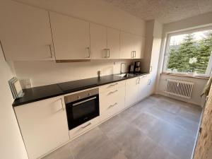 Η κουζίνα ή μικρή κουζίνα στο Cozy, totally renovated apartment, sleeps 6 +9 φωτογραφίες