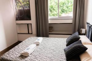 Postel nebo postele na pokoji v ubytování Tierra querida