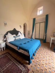 Postel nebo postele na pokoji v ubytování Villa Cannella