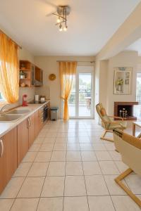 Η κουζίνα ή μικρή κουζίνα στο E&M Villa See View