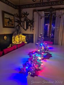 a room with christmas lights on the floor at Romantic get-away in Mölnlycke +20 photos