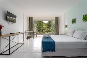 Postel nebo postele na pokoji v ubytování Suites em Angra dos Reis + 51 fotografií