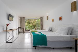 Posezení v ubytování Suites em Angra dos Reis