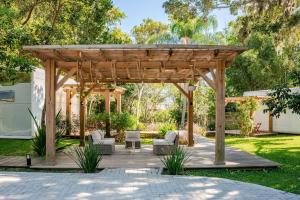 Zahrada ubytování Nautikus - Chalés no Canal da Barra da Lagoa