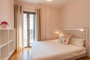 En eller flere senge i et værelse på Freedom Penthouse