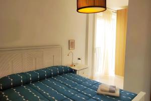 Postel nebo postele na pokoji v ubytování Comfortable Apartment In The Center