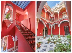 a red building with a staircase and a courtyard at Casa Palacio Guiomar by SHS in Seville +140 photos