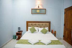 Ένα ή περισσότερα κρεβάτια σε δωμάτιο στο Best Inn