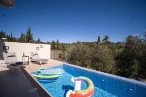 Πισίνα στο ή κοντά στο Giardinia Homes, car included