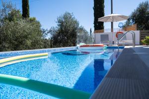 Swimmingpoolen hos eller tæt på Giardinia Homes private pool, Car Included