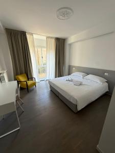 Ένα ή περισσότερα κρεβάτια σε δωμάτιο στο Bovara 49