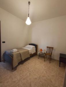 Ένα ή περισσότερα κρεβάτια σε δωμάτιο στο Guesthouse Matese