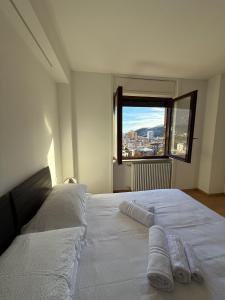 Ένα ή περισσότερα κρεβάτια σε δωμάτιο στο Bovara 49