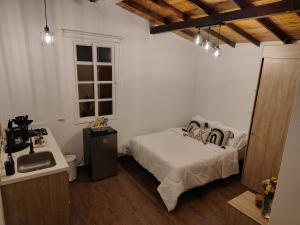 Ένα ή περισσότερα κρεβάτια σε δωμάτιο στο Herencia Colonial Glamping