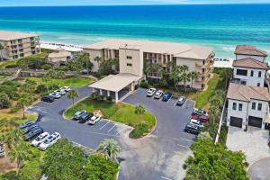 an aerial view of a parking lot at a resort at Beachy Keen - High Pointe E41 in Inlet Beach