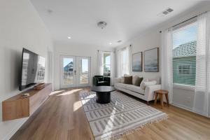 Μια τηλεόραση ή/και κέντρο ψυχαγωγίας στο Doodle Dunes by Youngs Suncoast