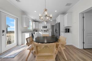 Η κουζίνα ή μικρή κουζίνα στο Doodle Dunes by Youngs Suncoast