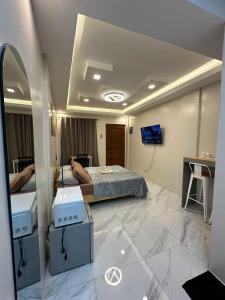 Postel nebo postele na pokoji v ubytování OYO 1181 Casa Leveria