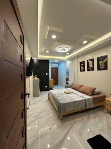 Postel nebo postele na pokoji v ubytování OYO 1181 Casa Leveria