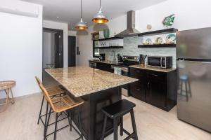 Kuchyň nebo kuchyňský kout v ubytování Seahorse Escape-apartment #4 condo