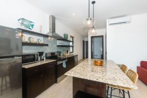 Kuchyň nebo kuchyňský kout v ubytování Seahorse Escape-apartment #1 condo