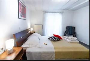 Ένα ή περισσότερα κρεβάτια σε δωμάτιο στο Detached Garden House