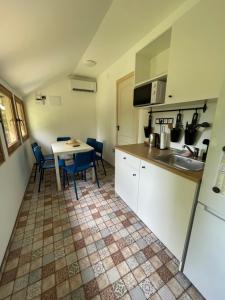 Kuchyň nebo kuchyňský kout v ubytování Fenyvesi Kuckó