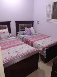 Fotografie z fotogalerie ubytování فيلا نادي الزهره v destinaci ‘Izbat Abū Sulayman