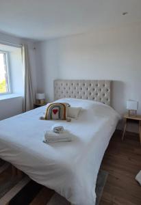 Postel nebo postele na pokoji v ubytování La Marilène Grange avec vue exceptionnelle