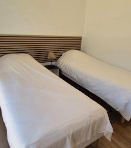 Postel nebo postele na pokoji v ubytování La Marilène Grange avec vue exceptionnelle