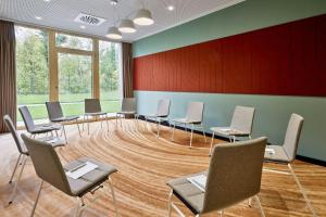 Posezení v ubytování Flesslers Lenggries, a Tribute Portfolio Hotel