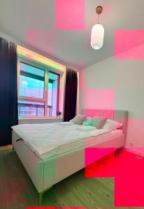 Postel nebo postele na pokoji v ubytování Forest Apart IX Aleje Jerozolimskie