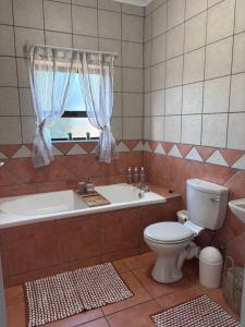 Ένα μπάνιο στο 36 Villa Pirogue - Home away from home