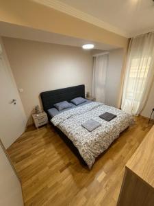 Postel nebo postele na pokoji v ubytování City center apartment 3