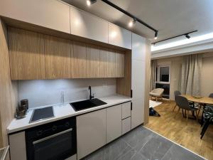 Kuchyň nebo kuchyňský kout v ubytování City center apartment 3