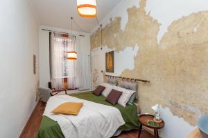 Ένα ή περισσότερα κρεβάτια σε δωμάτιο στο Casa Agnelli eleganza e comfort in zona signorile