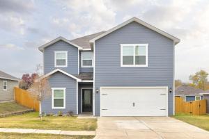 a gray house with a white garage at Venice, Large Modern 5BRMs, 2 Living RMs, Parking, Close to Dallas Downtown in Dallas