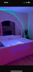 a room with a large tub in a room at Claustro Segreto - ALTAMURA in Altamura