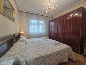 Postel nebo postele na pokoji v ubytování 213A by R2R Apartamento Maximino