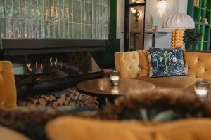 Χώρος καθιστικού στο Home Hotel Drott